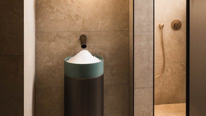 Modern spa area with salt container and warm lighting