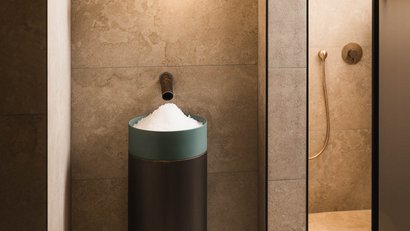 Modern spa area with salt container and warm lighting